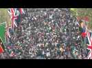 Crowds run to catch a glimpse of royals on Buckingham Palace balcony