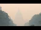 US capital wakes to acrid smell and orange-tinged skies caused by Canadian wildfires