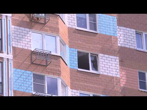 Building window damaged after a rare drone attack hits Moscow