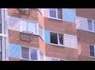 Building window damaged after a rare drone attack hits Moscow