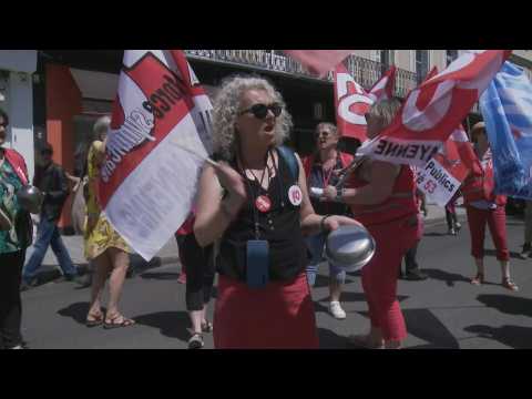 Protesters bang pots and pans as French PM visits town of Laval