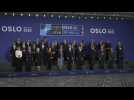 NATO foreign ministers pose for a group photo at Oslo meeting