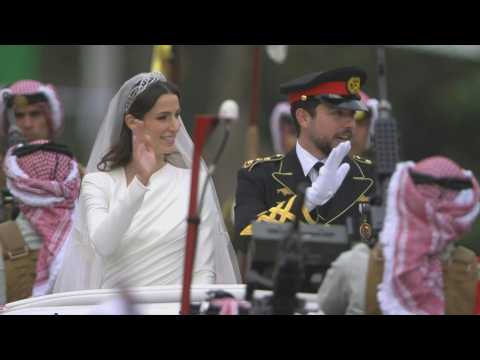 Crown Prince Hussein, Rajwa Al Saif wave to Jordanians celebrating royal wedding