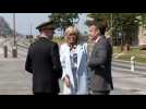 Emmanuel and Brigitte Macron arrive at the Couesnon dam near Mont-Saint-Michel