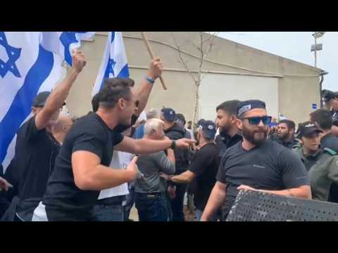 Israeli security forces scuffle with protesters during anti-govt rally