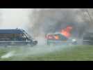 Protesters in France set police vans on fire
