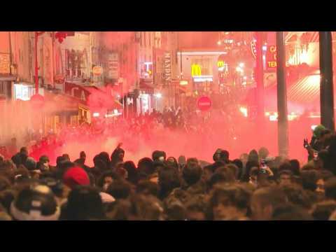 French police use tear gas against pension reform protesters in Paris