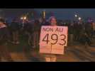 Demonstrators gather in Paris as pension reform definitively adopted