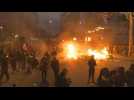 French protesters set dumpsters on fire during march against pension reform