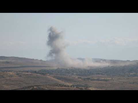 Plumes of smoke rise as Russian aircraft bombards area of Syria's Idlib province