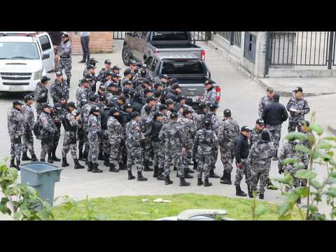 Ecuador police outside prison as inmates hold guards, police hostage