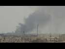 Smoke billows, gunshots ring out during clashes in Khartoum