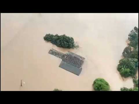 Brazil: Brigades rescue family from flooded house after heavy rains