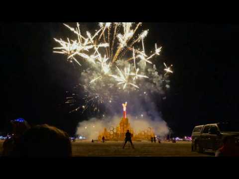 Burning Man effigy burns at drenched party in US desert