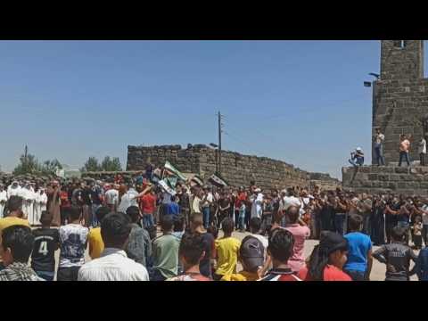 Syrian protesters in Daraa province demand regime overthrow