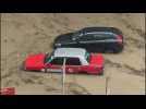 Heavy rainfall causes widespread flooding, cars submerged