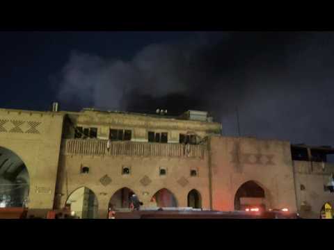 Smoke rises over Arbil's Qaysari bazaar after a fire breaks out