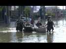Brazil: Residents navigate Porto Alegre's flooded streets in boats