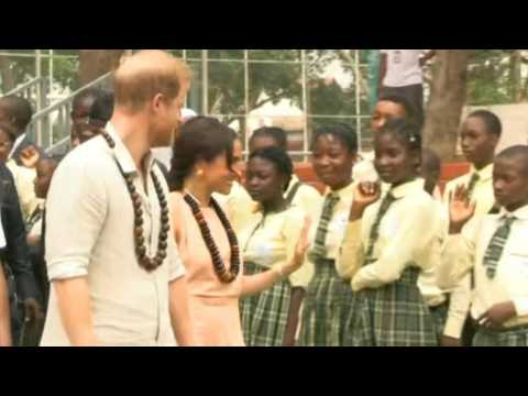 Prince Harry and Meghan leave school in Abuja after kicking off a mental health summit