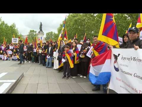 Demonstrators gather in Paris against Chinese Xi Jinping's visit