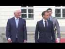 France's Macron welcomed with military honours by German President