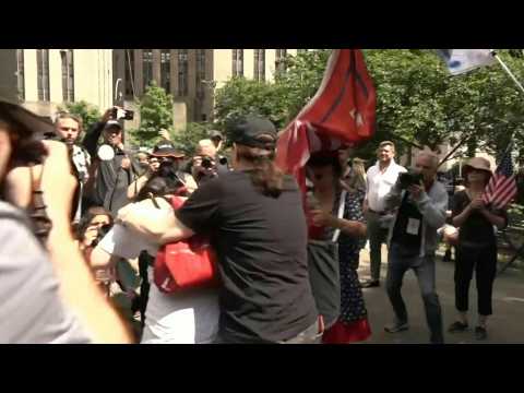 Pro- and anti-Trump protesters scuffle outside court as jury deliberates