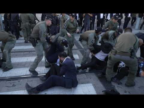 Israeli police disperse ultra-Orthodox Jews protesting army conscription