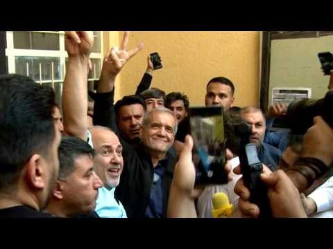 Iran's Masoud Pezeshkian arrives at polling station to vote in runoff election