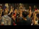 Demonstrators in Marseille celebrate the results of the French general elections