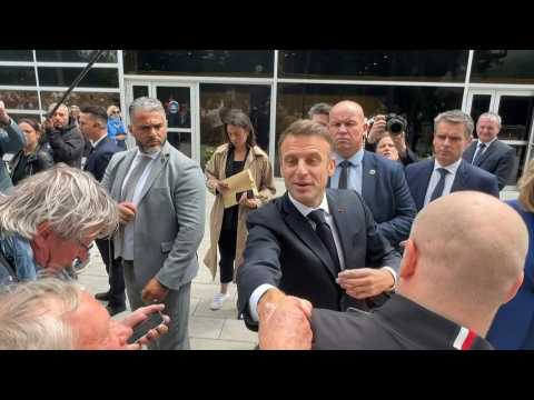 Elections : Emmanuel and Brigitte Macron greet residents after voting