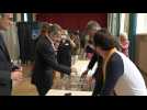Former French president Sarkozy votes in Paris