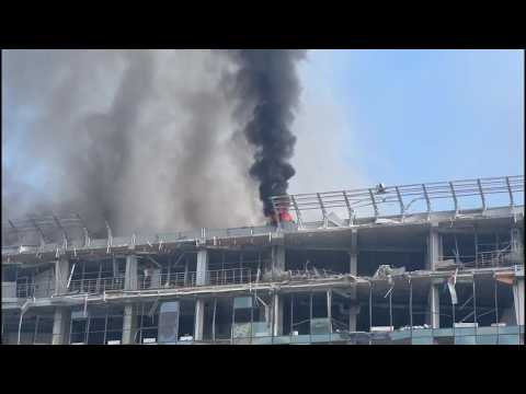 Smoke rises from damaged buildings in Kyiv after Russian attacks