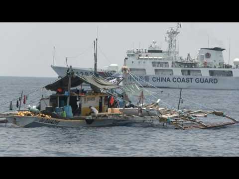 Chinese vessels shadow Philippine civilian convoy sailing towards disputed reef