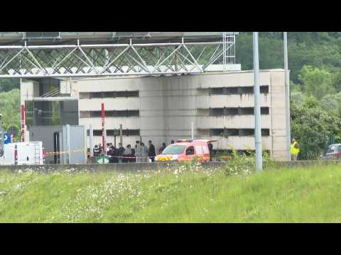 Forensic police at the site of the prison van attack in Normandy