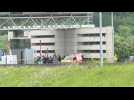 Forensic police at the site of the prison van attack in Normandy