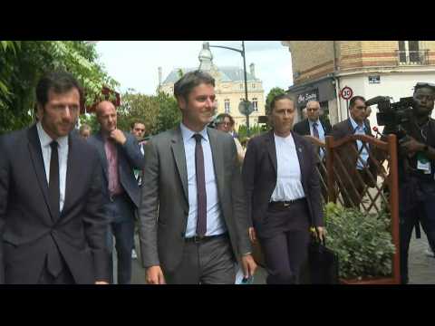 French PM campaigning for the general election near Paris