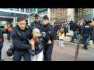 Police remove Extinction Rebellion activists outside Amundi HQ in Paris