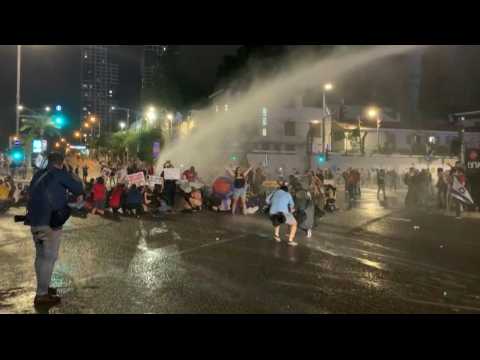 Israeli police scuffle with anti-government protesters in Tel Aviv