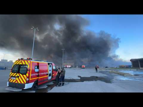 Smoke billows from Kharkiv hardware store as Russian strike kills at least two
