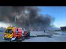 Smoke billows from Kharkiv hardware store as Russian strike kills at least two